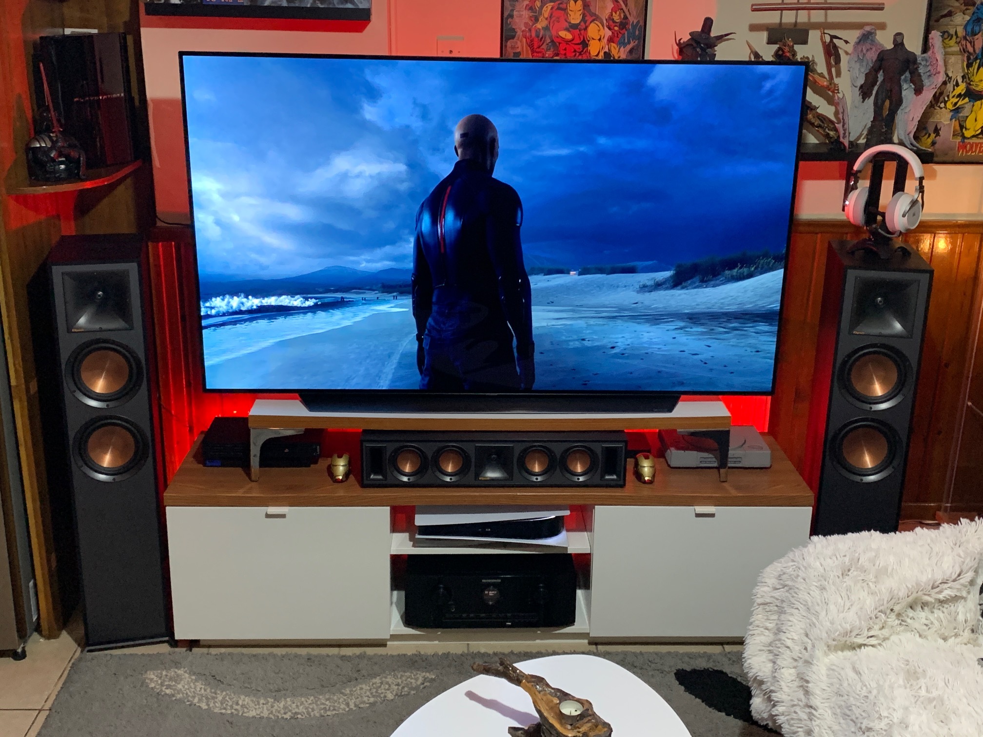 Klipsch center channel and floorstanding speakers next to TV